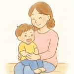 お母さんの膝の上に座る子供